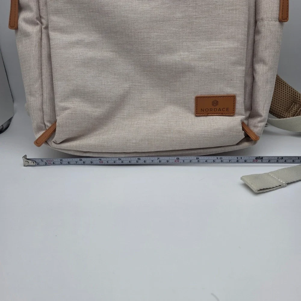 Nordace Siena Smart Backpack Beige ‎  Laptop Charging Travel Bag Luxury Neutral